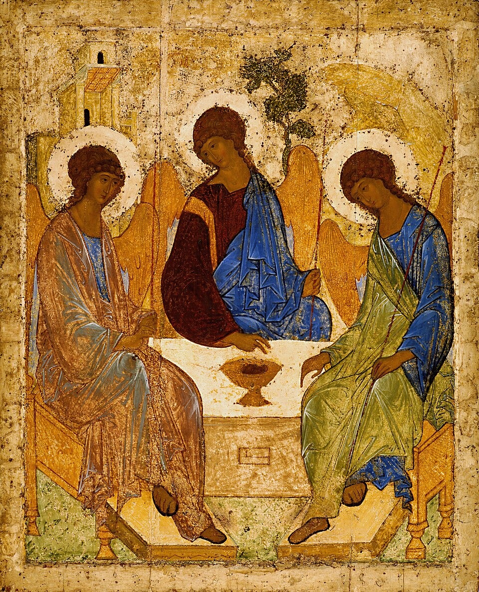 Rublev’s icon of the Trinity: three winged angels with golden haloes seated around a table with a chalice.