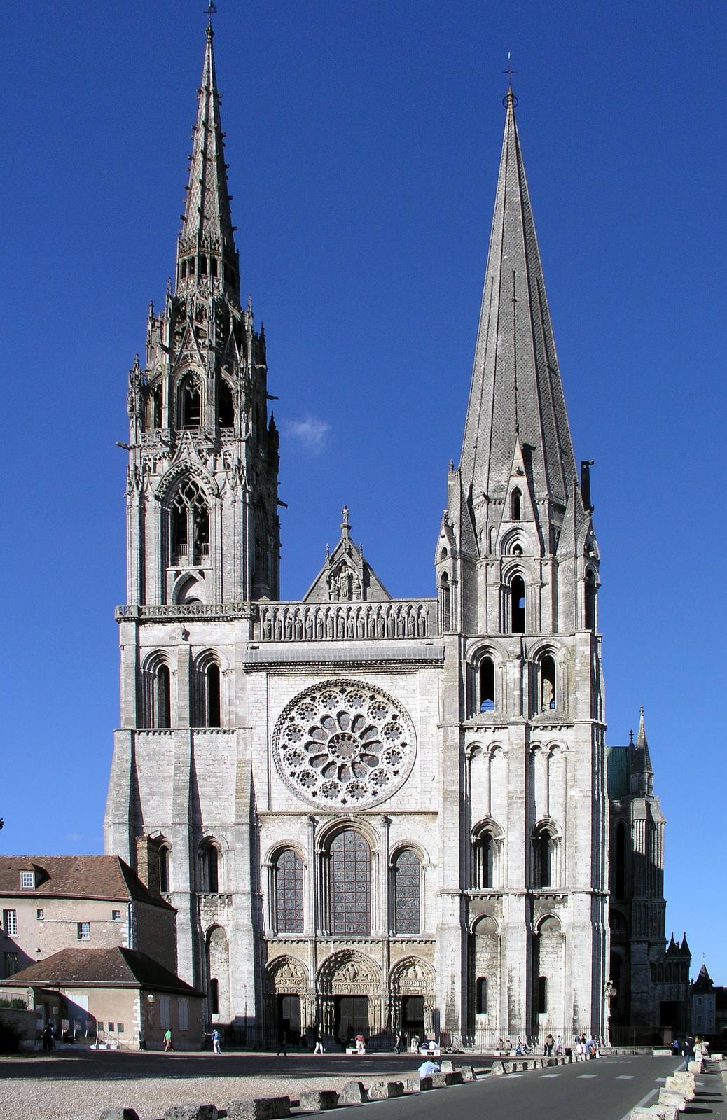The west front of Chartres Cathedral, with its two dissimilar spires and rose window.