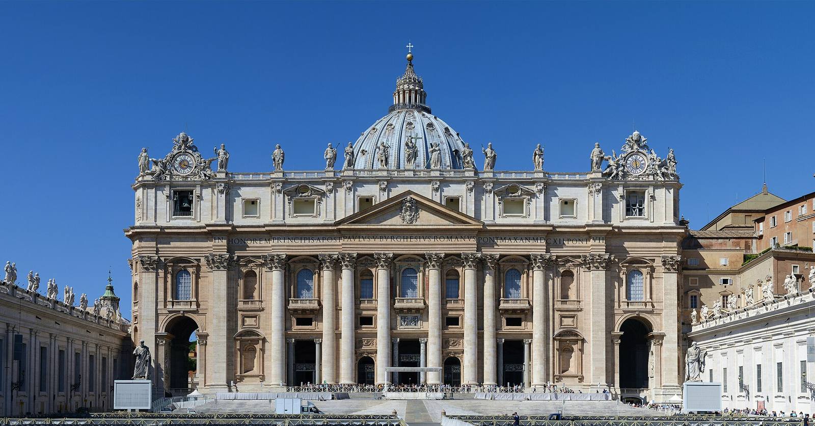 The wide façade of St Peter’s Basilica, with Michelangelo’s dome rising behind it.