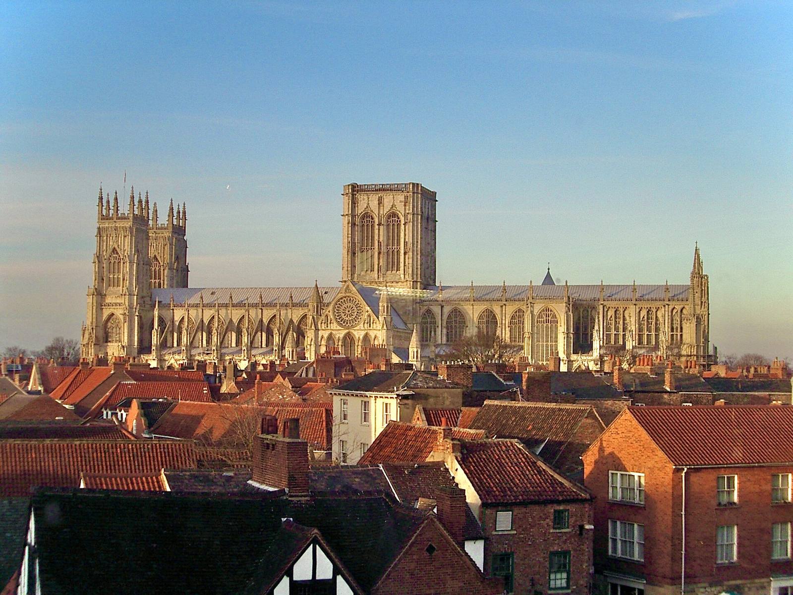 York Minster’s three towers rising above the red roofs of York.